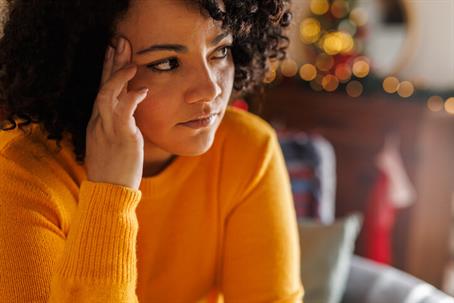 woman feeling anxious during christmas season